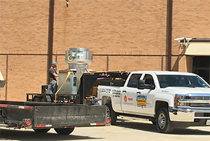 Commercial AC being unloaded